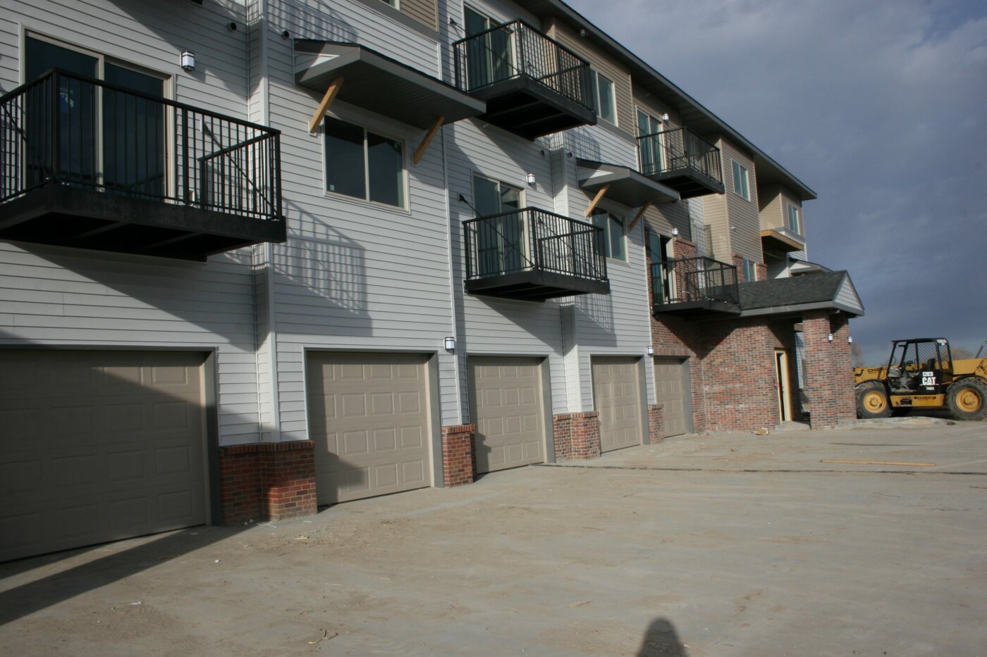 Side of Building Showing Garages and Balconies